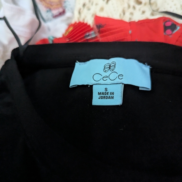 CeCe Black Top with White Patterned Puff Sleeves - Picture 6 of 6